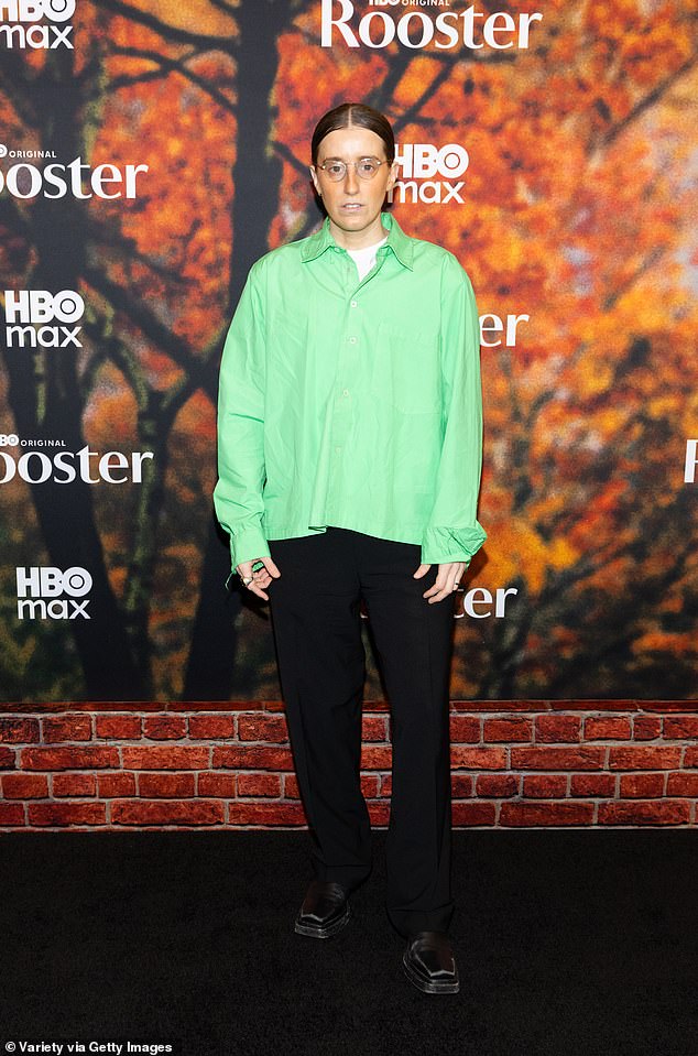 Comedian Robby Hoffman stood out on the red carpet in a key lime green shirt with dark pants and square-toed black leather shoes