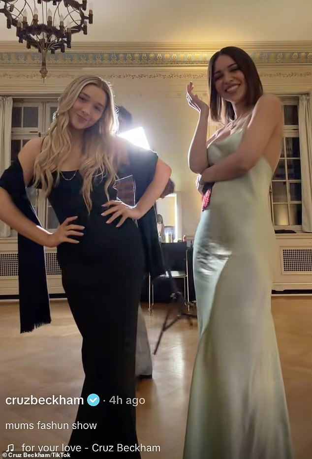 Jackie couldn't contain her giggles as Cruz photobombed them while filming with a spotlight