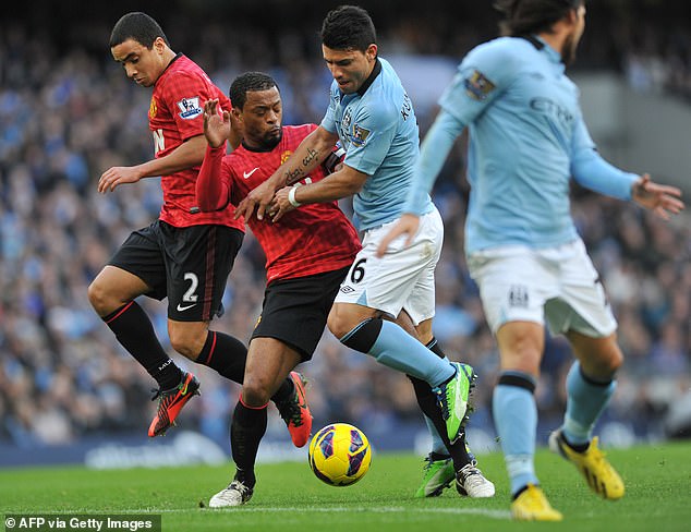 Evra and Aguero played on opposite sides of Manchester when they were both battled for titles