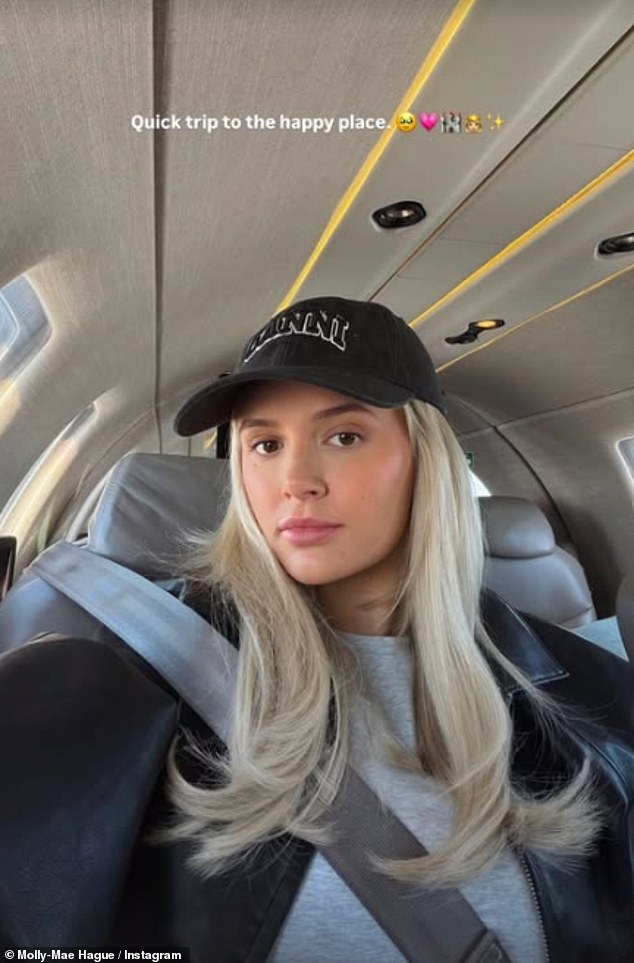 She penned: 'Quick trip to the happy place' along side a selfie before posting an adorable snap of Tommy and Bambi beaming away