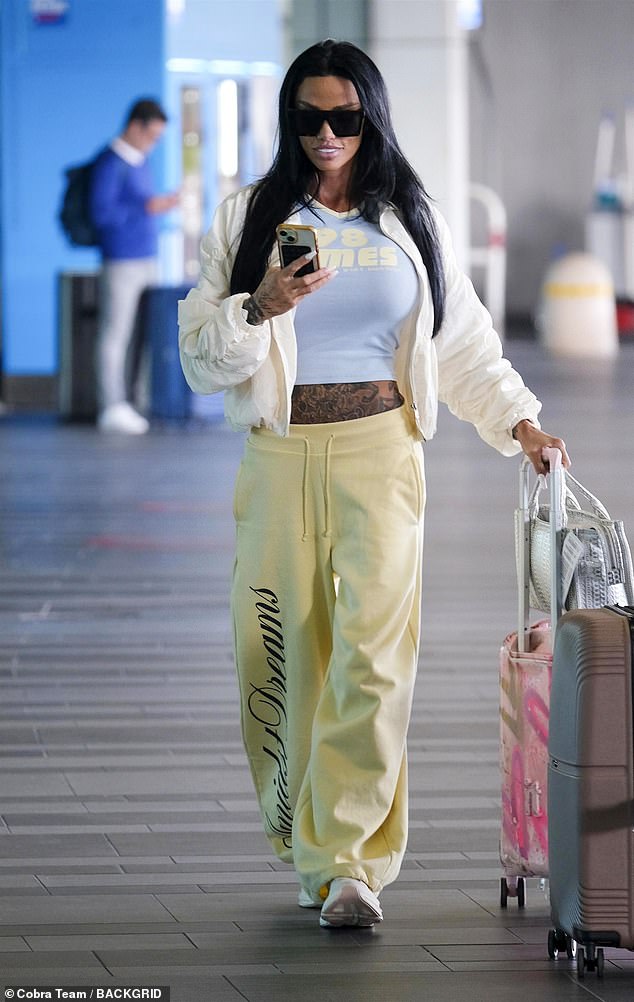 Katie Price and her new husband Lee Andrews remain separated as she travelled to Rome on Wednesday, whilst he remains in Dubai