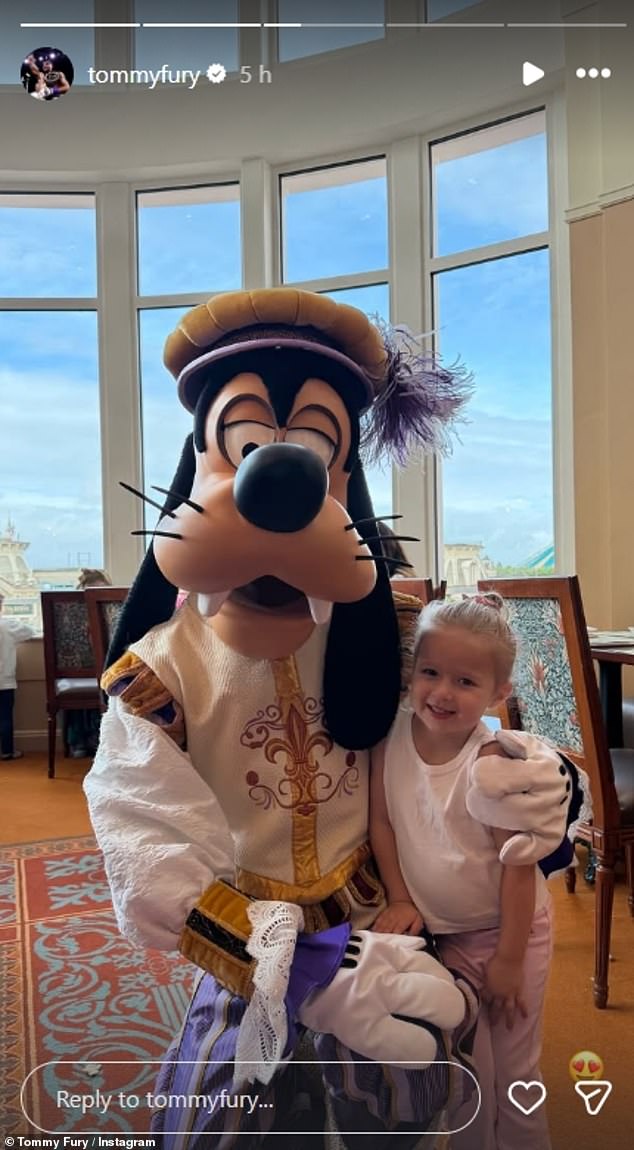 Tommy was every inch the proud dad as he shared this sweet photo of the moment Bambi met Goofy