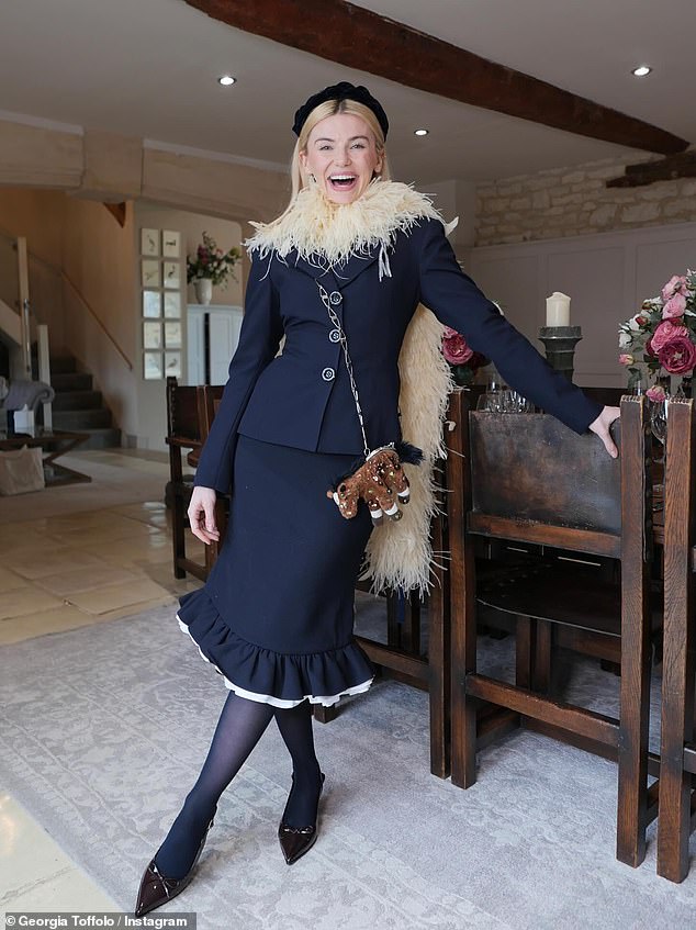 She lookeed sensational in her elegant ensembl e