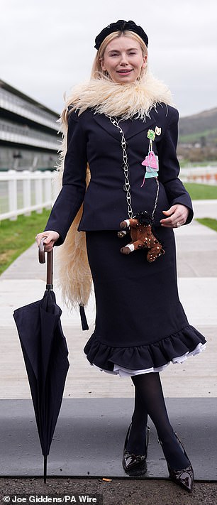 Georgia Toffolo got in the spirit as she sported a bag in the shape of a horse, (left)