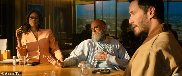 On the far left is Laverne Cox with Hill and Reeves