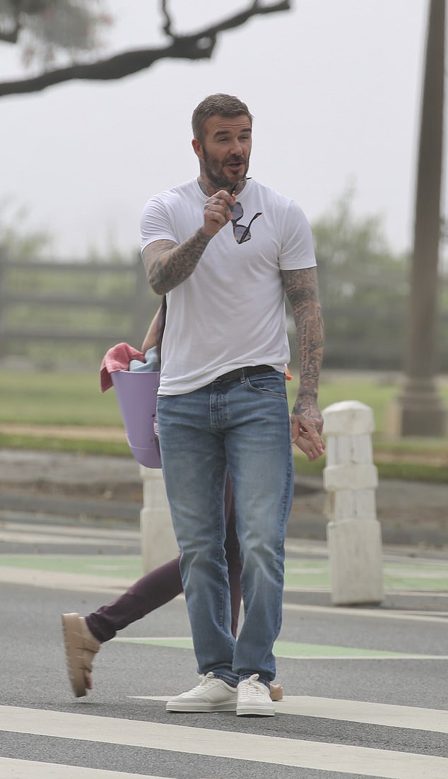 Sir David, 50, had an early start to get to a filming location five miles away in Santa Monica to record an advert for Lays crisps, the sponsor of the forthcoming World Cup