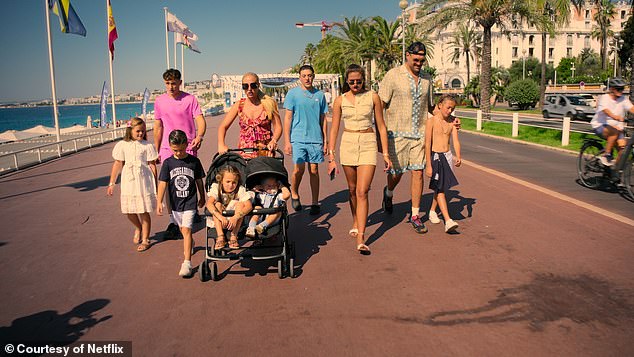 Tyson Fury pictured with his wife Paris and their eight children while away on holiday