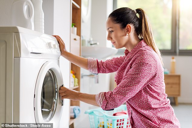 Experts at AO.com have revealed why you should never close the washing machine door after a wash (stock image)