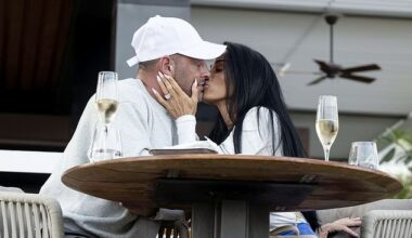 Katie Price and husband Lee Andrews showed off the results of their cosmetic procedures while packing on the PDA in war-torn Dubai on Friday