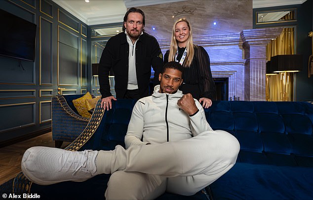 The progress of Joshua, pictured with Usyk and Daily Mail Sport’s Charlotte Daly, has been steady but measured, as Usyk notes. 'I think he’s getting better,' says the Ukrainian
