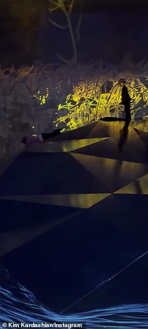 Kim also shared footage of her 10-year-old son Saint and six-year-old son Psalm sliding down one of the museum's installations