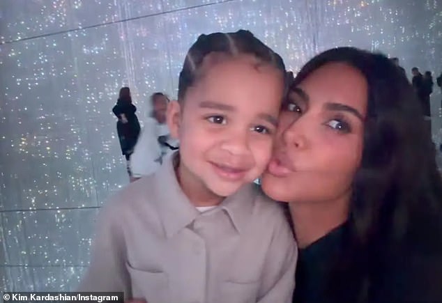 And while Kardashian didn't appear to visit teamLab Borderless: MORI Building DIGITAL ART MUSEUM, her big sister Kim (R) took care of little Tatum at the popular immersive museum