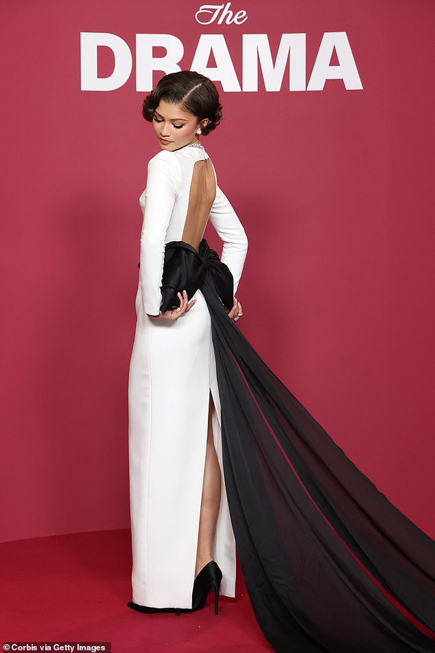 For the 'something new' , Zendaya slipped into a brand new custom Louis Vuitton dress in bridal white with a large black bow on the back for the Paris premiere on Tuesday