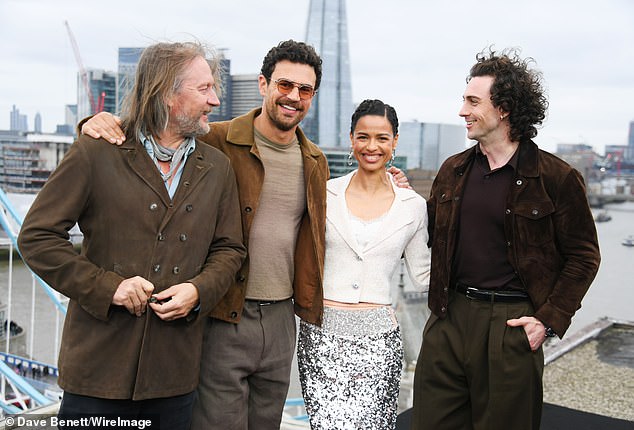 The group appeared in great spirits as they posed together