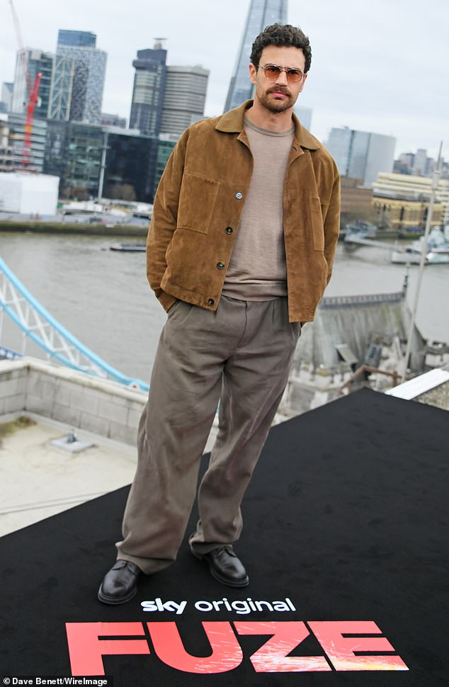 Theo, 41, who is at 15/2, matched in a lighter suede look which he teamed with a beige sweater, baggy trousers and shades