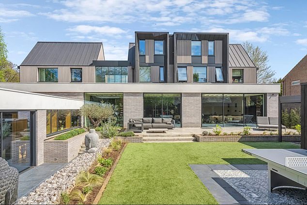 Julian Hearn paid £1.39 million for a detached home overlooking Berkhamsted castle in 2020 before knocking the house and replacing it with a striking modern mansion
