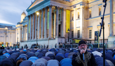 Members of the Muslim community pray ahead of the 'open iftar' Ramadan dinner event at Trafalgar Square in London