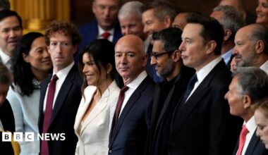 Appearing at the second inauguration of Donald Trump, from left to right: Mark Zuckerberg in a black suit, white dress shirt and red necktie; Jeff Bezos in a navy suit, white dress shirt and red neck tie; Sundar Pichai in an all black suit, shirt and neck tie; Elon Musk in a black suit, white dress shirt and navy neck tie