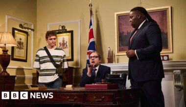 SNL UK star George Fouracres as Keir Starmer on the phone in his office, along with Hammed Animashaun as David Lammy