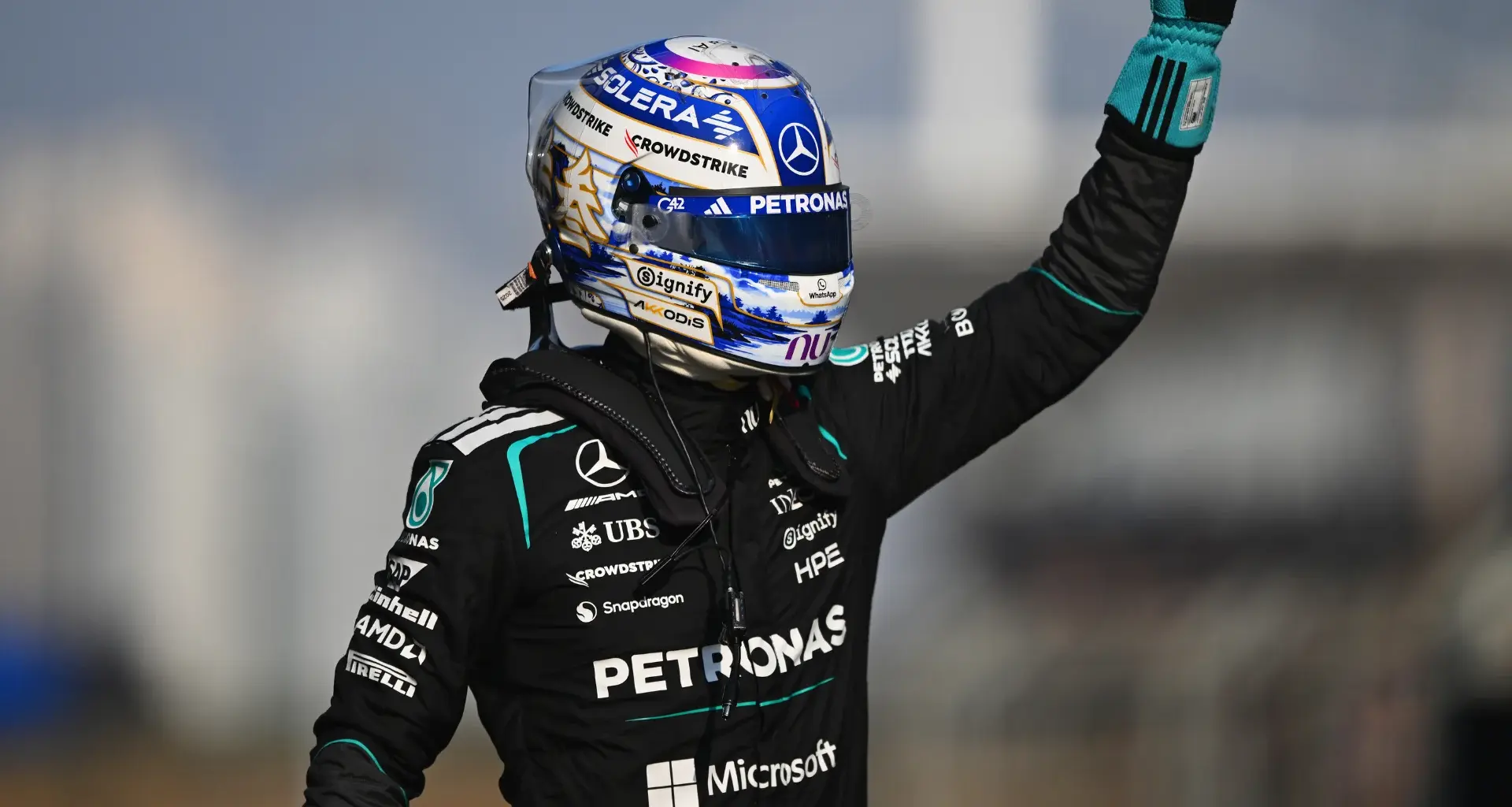 SHANGHAI, CHINA - MARCH 12: Arvid Lindblad of Great Britain and Visa Cash App Racing Bulls talks to