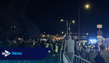 Police block road as protesters gather after Edinburgh double murder bid
