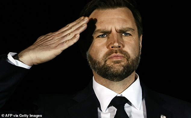 US Vice President JD Vance salutes as members of a US Army team carry a flagged-drapped transfer case containing the remains of Sgt. Benjamin N. Pennington, 26, of Glendale, Kentucky, during a dignified transfer solemn event at Dover Air Force Base, in Dover, Delaware, on March 9, 2026. (Photo by Brendan SMIALOWSKI / AFP via Getty Images)