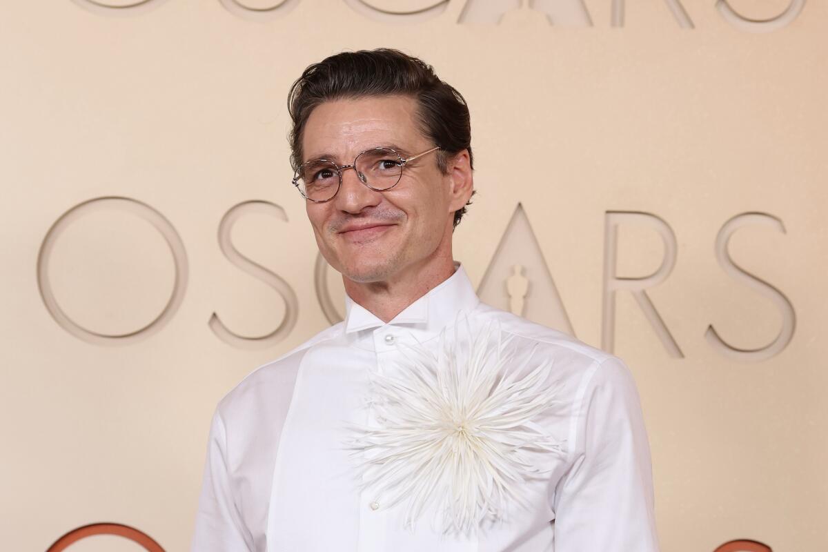 Pedro Pascal arrives on the red carpet at the 98th Annual Academy Awards 