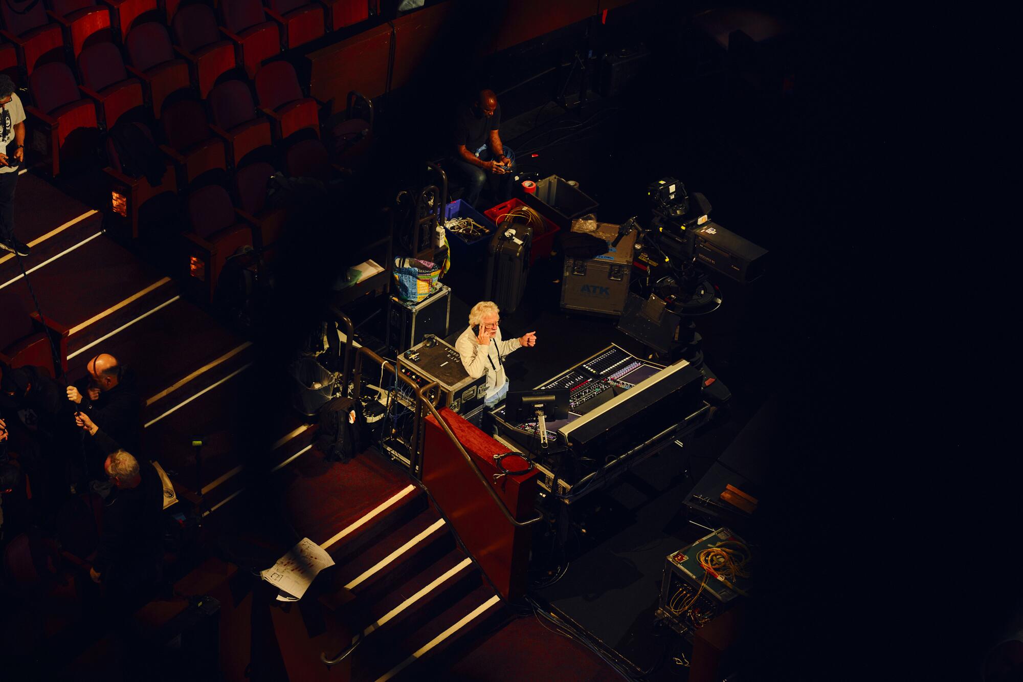 The Oscars front-of-house audio mixer works from his soundboard. 