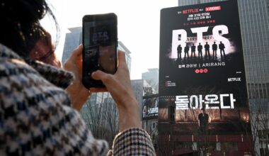 A fan records a promotional video for BTS