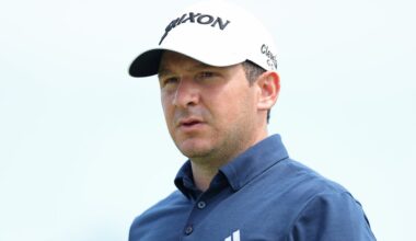 Golf star explains custom bib as he launches search for a wife during tournament