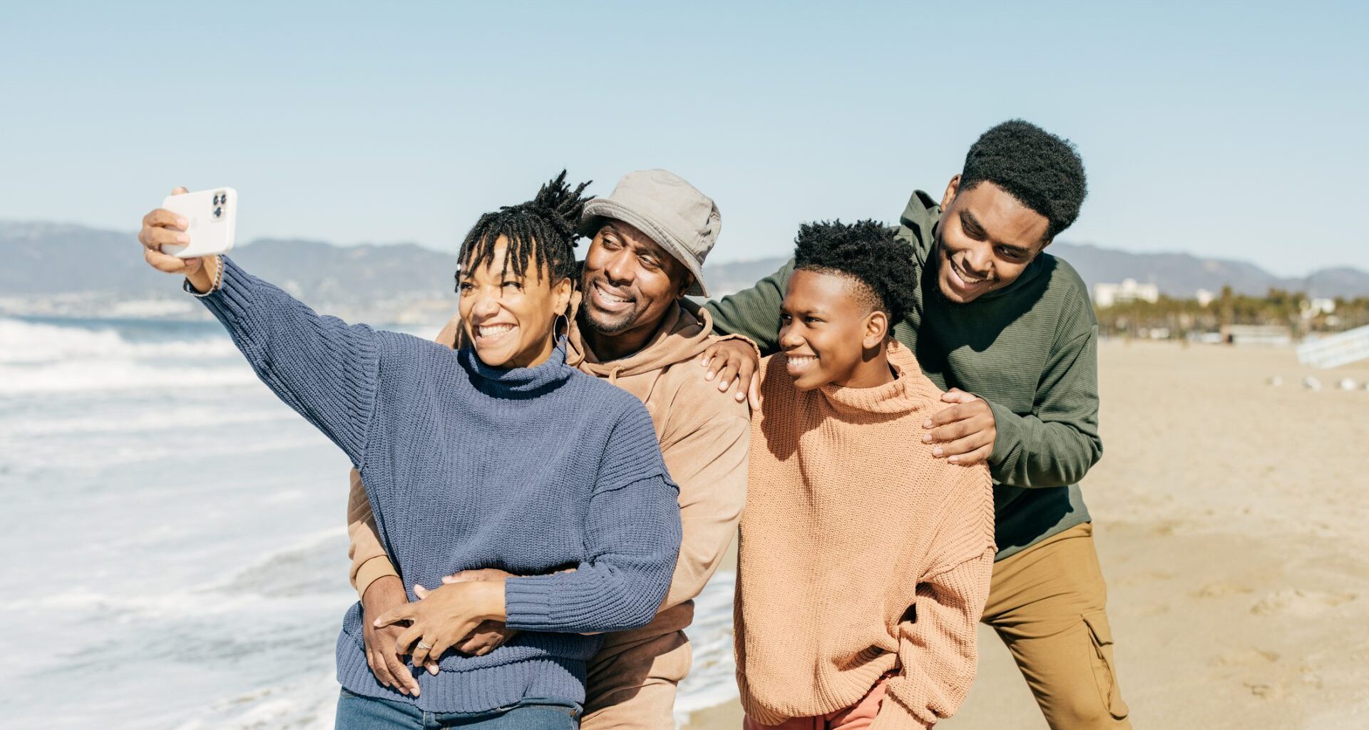 Family with two kids on their  Holidays in California near the ocean.
