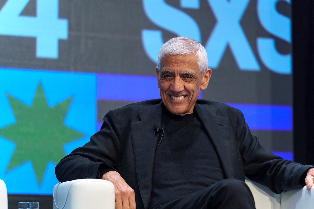 Vinod Khosla speaking at SXSW 2024, addressing tech innovations and entrepreneurship, wearing a suit on stage.