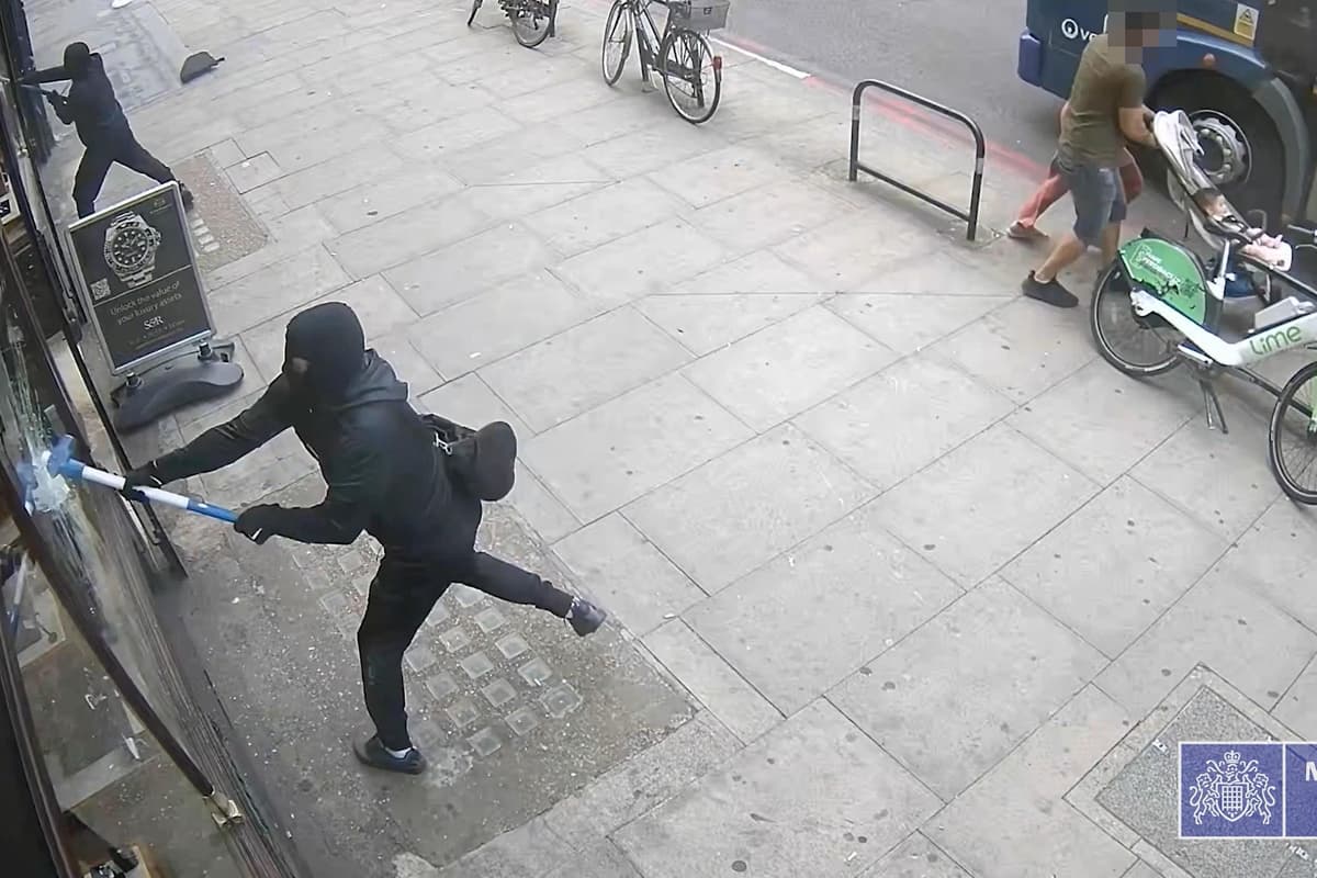 Moment masked raider attacks London store with sledgehammer as gang jailed for £100,000 crime spree - London Evening Standard