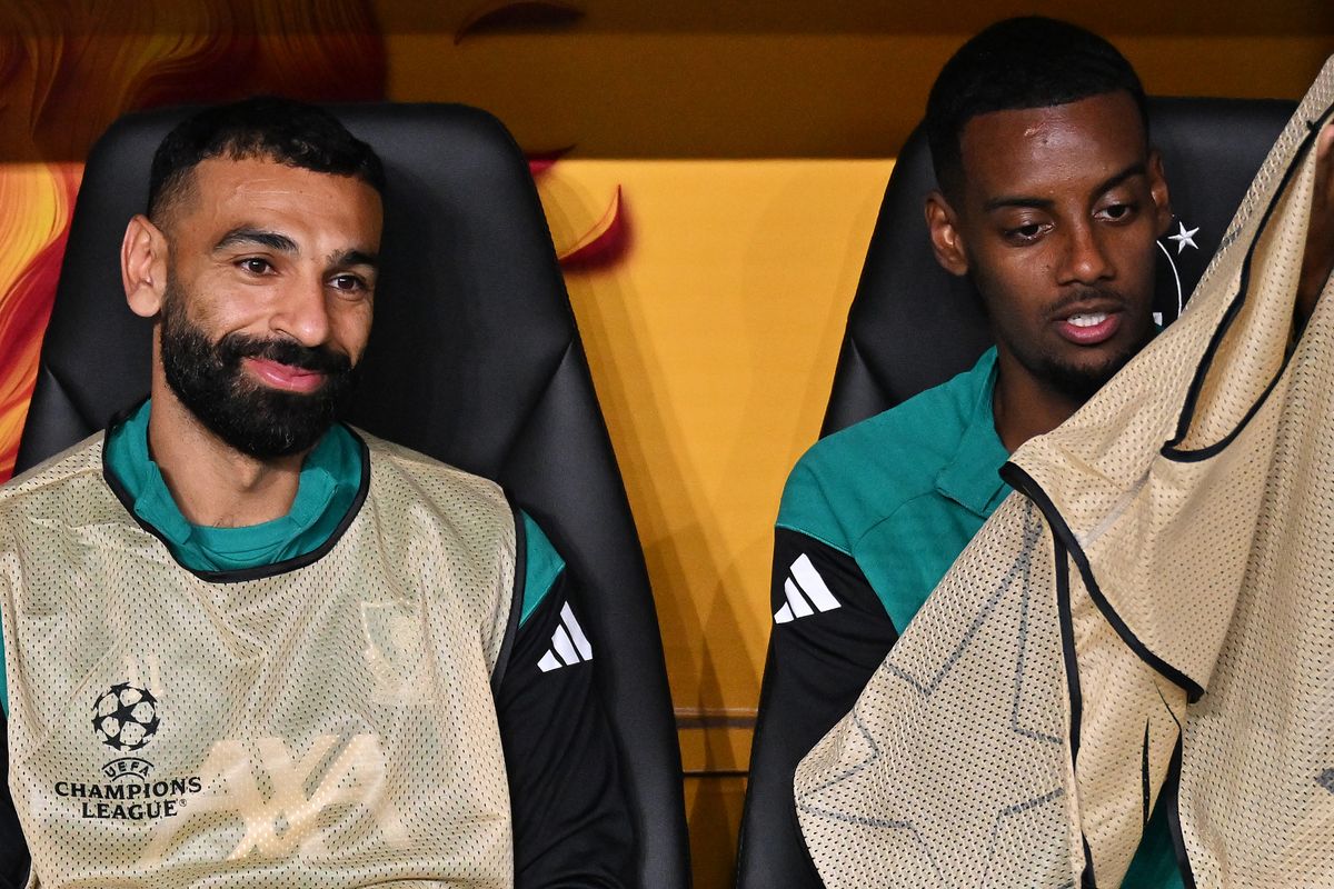 Mohamed Salah, Alexander Isak and Alexis Mac Allister of Liverpool look on from the dugout prior to the UEFA Champions League 2025/26 League Phase MD2 match between Galatasaray A.S. and Liverpool FC at Ali Sami Yen Spor Kompleksi on September 30, 2025 in Istanbul, Turkey.