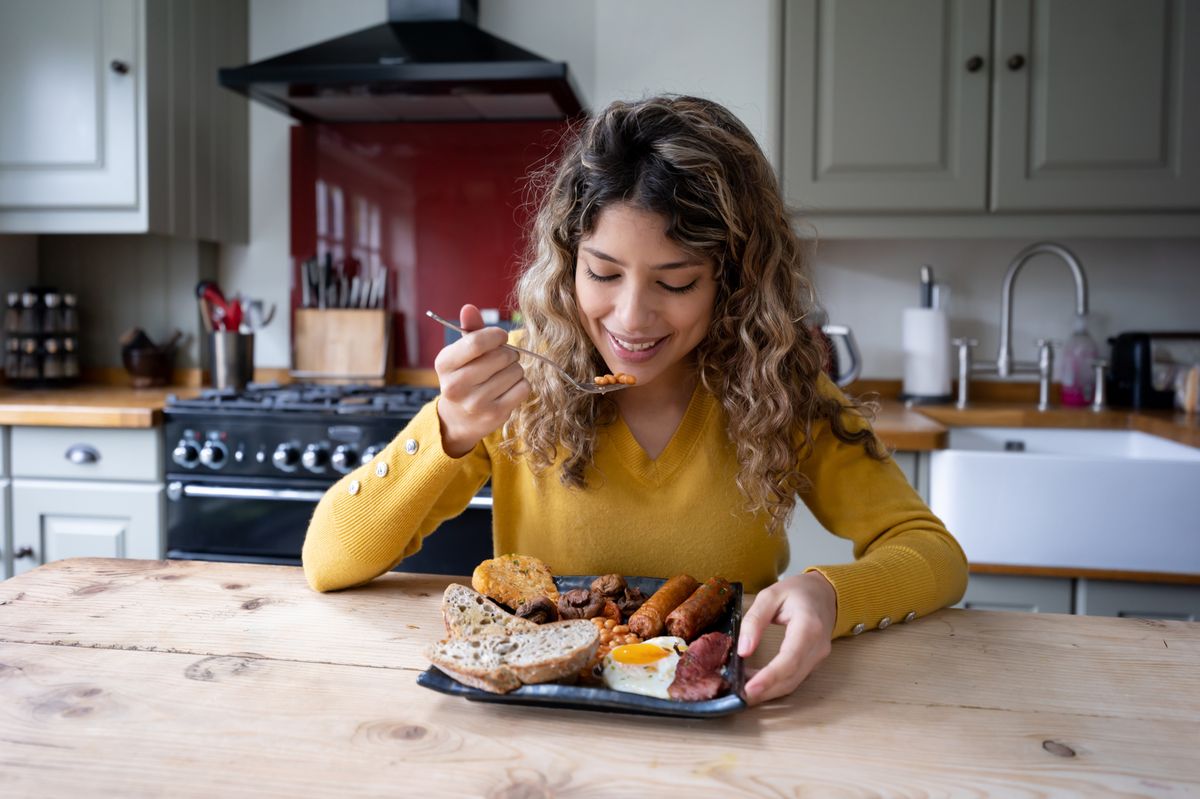 A woman eating breakfast