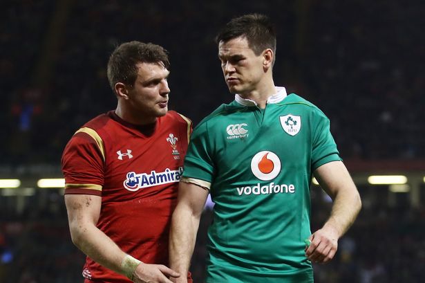Dan Biggar of Wales and Jonathan Sexton of Ireland in discussion 
