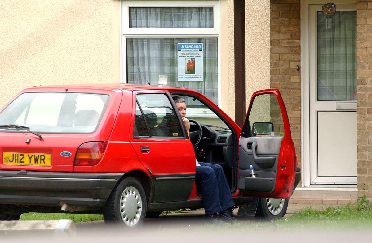 File photo dated 08/08/02 of 
caretaker Ian Huntley sitting in his car outside his house near the college in Soham, Cambs, during the period when police were looking for 10-year-old Holly Wells and Jessica Chapman. Soham killer Ian Huntley has died in hospital after he was attacked in the workshop of the maximum security Frankland prison by an inmate with a metal bar on February 26, the Press Association understands. Issue date: Saturday March 07, 2026. PA Photo. Photo credit should read: Andrew Parsons/PA Wire