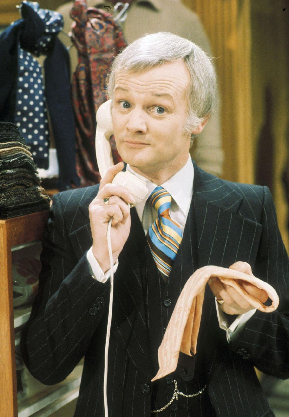 He famously portrayed the flamboyant salesman Mr Humphries in the comedy series Are You Being Served?
