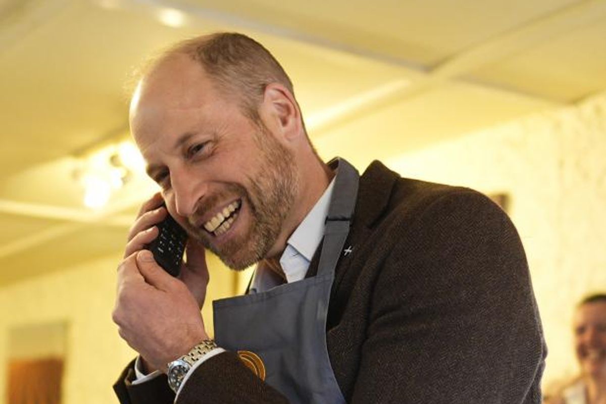 Prince William takes a pasty order on the phone while visiting Gear Farm on the Lizard peninsula and gets her name wrong