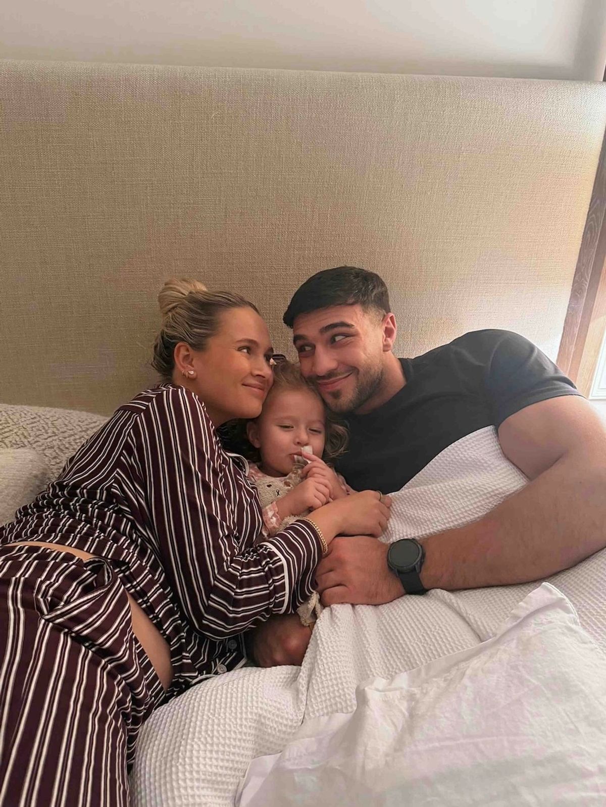 molly, tommy and bambi in bed