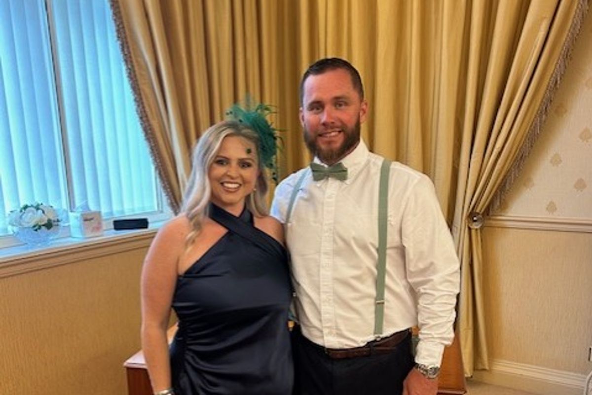 A man and a woman smiling