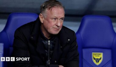 Blackburn Rovers boss Michael O'Neill sits in the Oxford United dugout at the Kassam Stadium