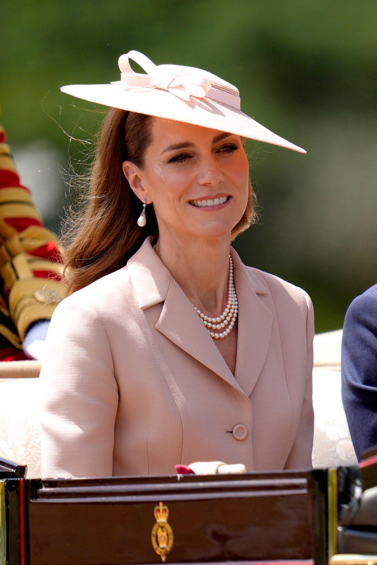 The Princess of Wales rides in a carriage procession at the start of the French state visit to Britain on July 8, 2025 (Andrew Matthews/PA Images/Alamy)