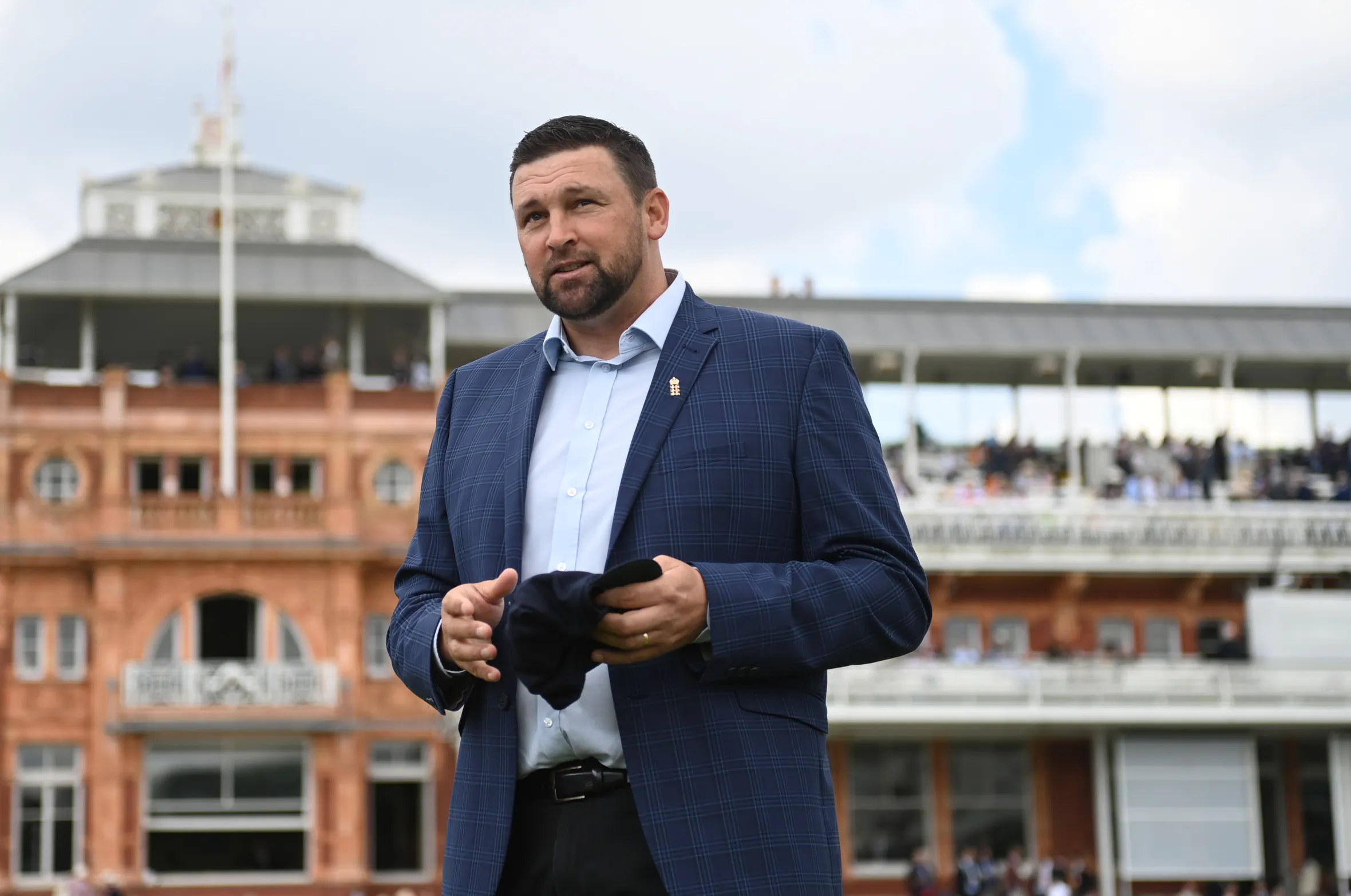 Steve Harmison presenting Matthew Potts with his test cap.