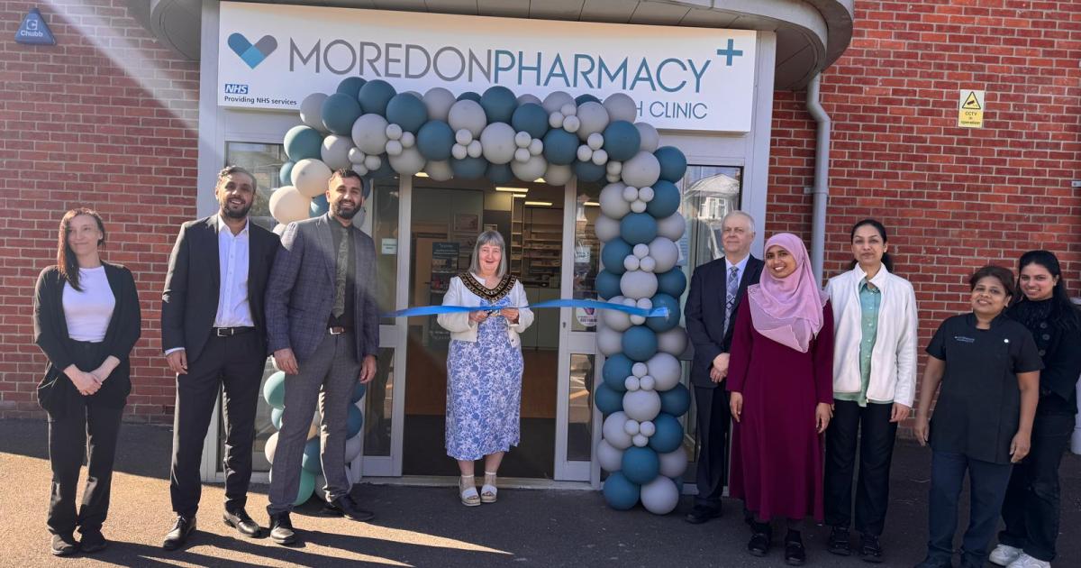 Pharmacy hosts grand opening after new owners' improvements