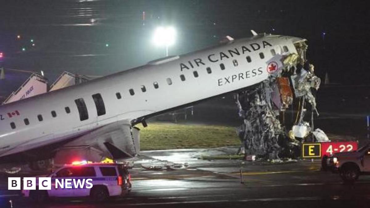 LaGuardia: Two pilots killed after plane collides with fire truck at New York airport - follow live