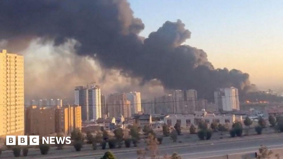 Israel says it hits security headquarters across Tehran, as Iran attacks US sites in Dubai and Qatar