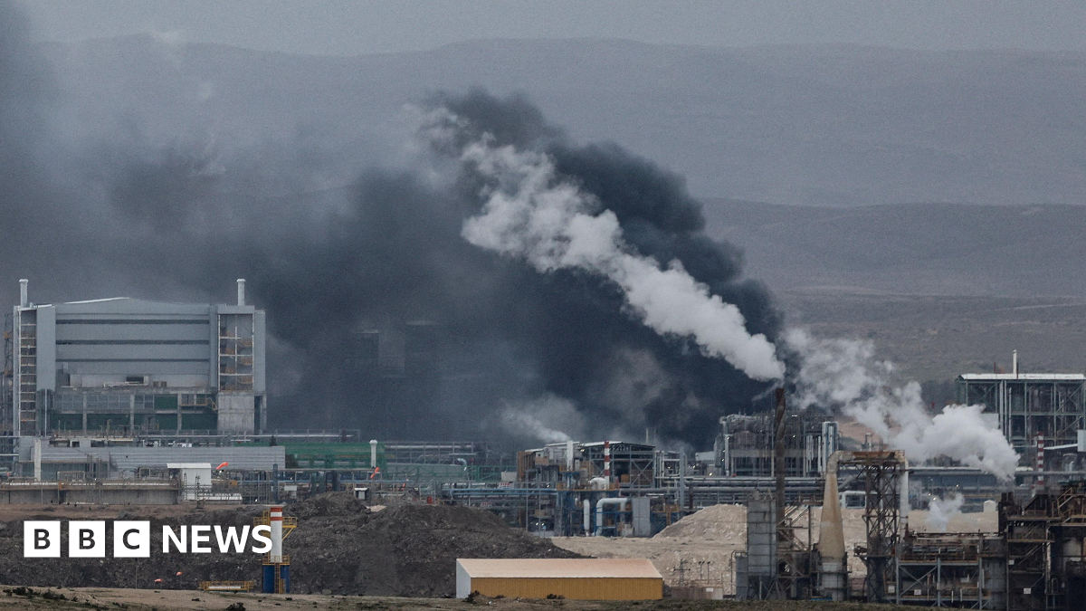 Israel says industrial site on fire after Iranian attack as hundreds mourn killed journalists in Lebanon