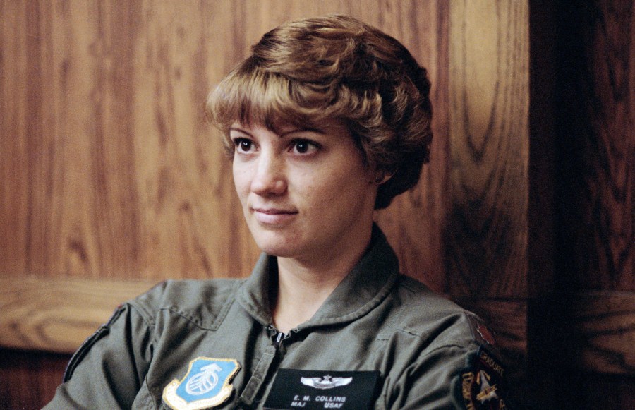 Eileen Collins listens to a briefing on parachute ejection during a training course hosted by Vance Air Force Base in Oklahoma.