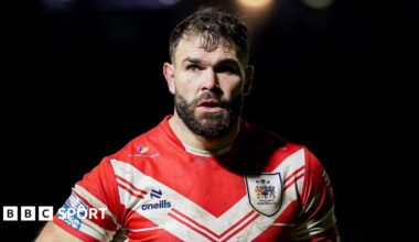 Alex Walmsley stood with his hands on his hips during a St Helens game